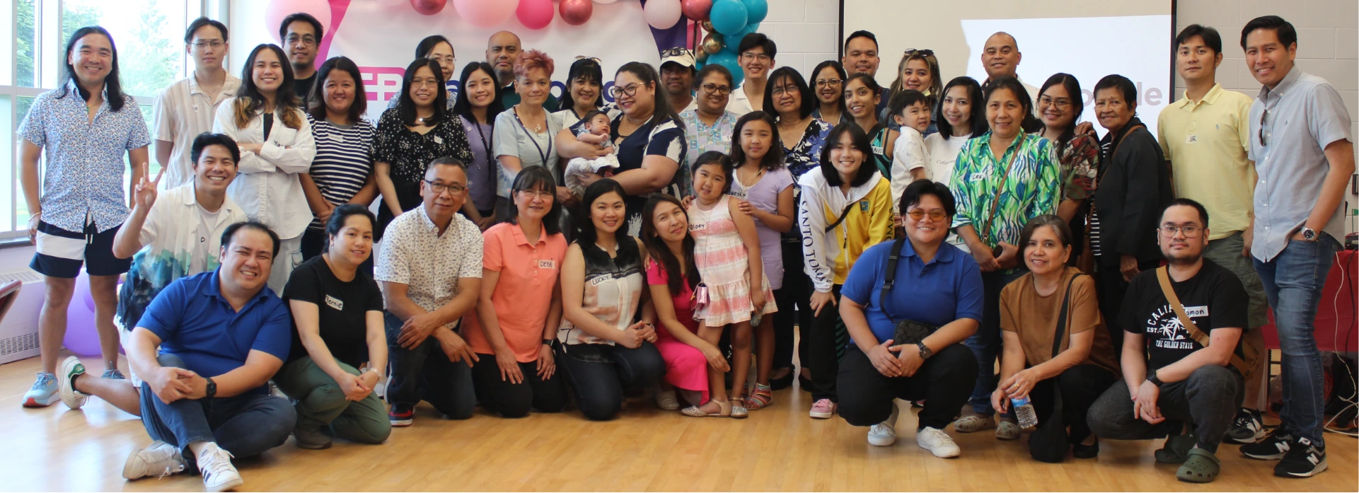 CareProvide community members gathered for a group photo at a company event