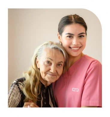 Caregiver providing emotional support and companionship to a woman at home